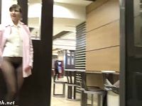 Exhibitionist girl Jeny spreads her legs in seamless pantyhose in the cafe